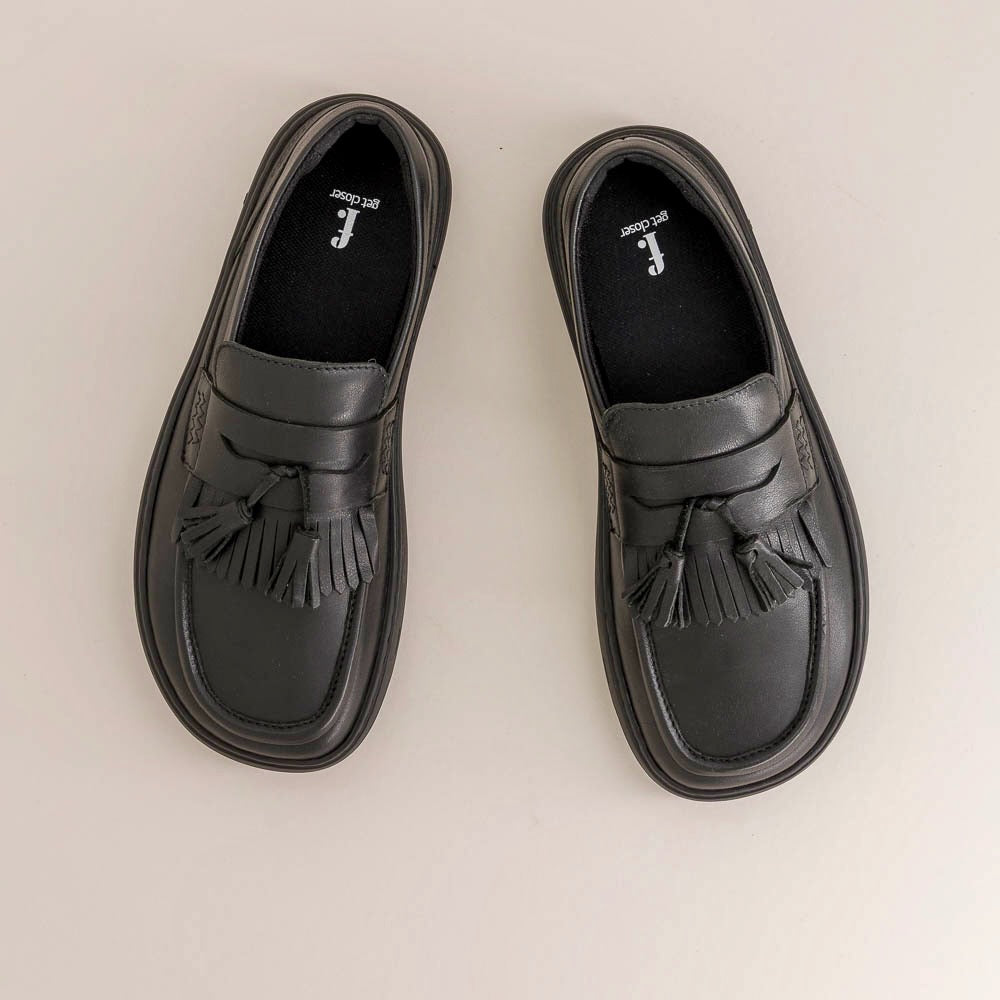 Top view of barefoot loafers in black leather