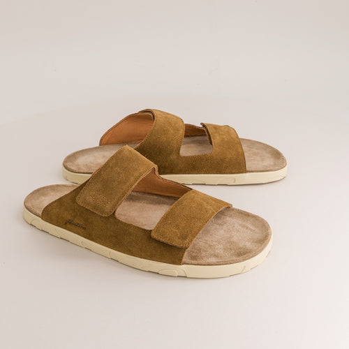 Pair of brown barefoot sandals.