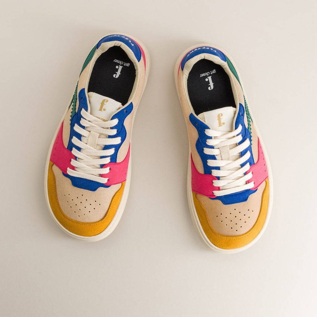 Colorful sneakers on a light gray background