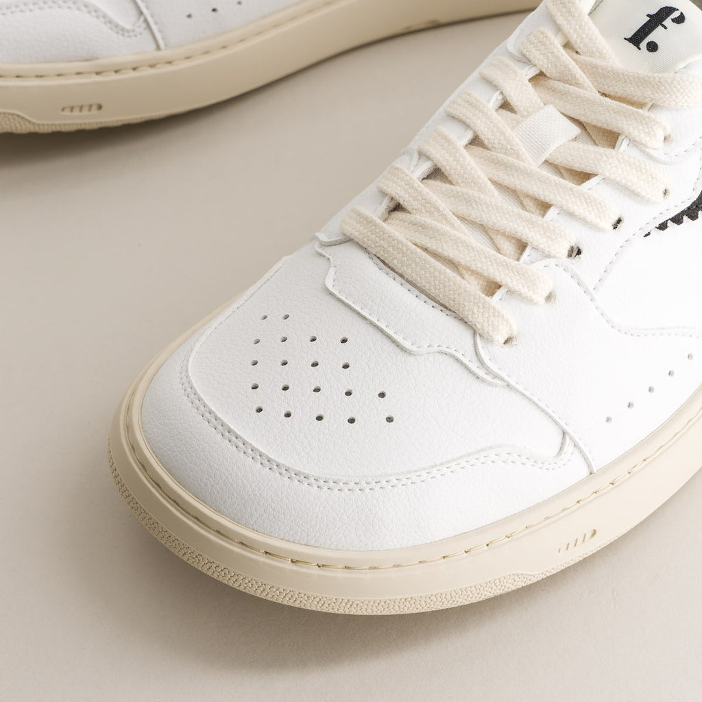 White & Black barefoot sneakers - detailed view