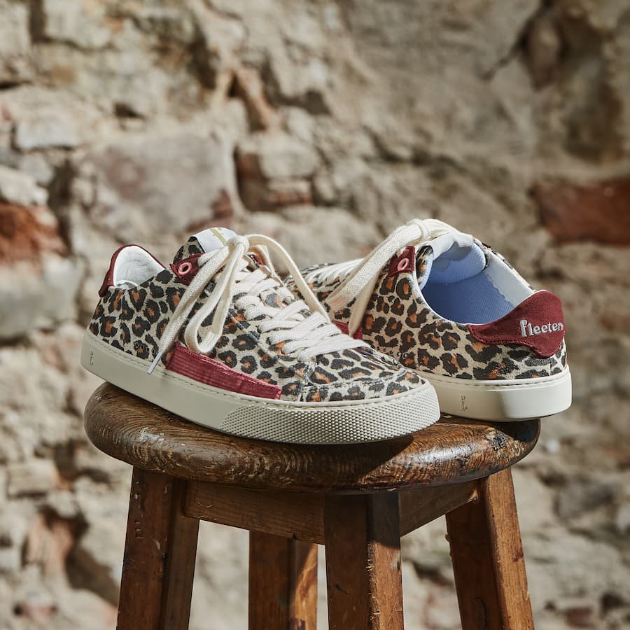 Peach Leopard Borgona Barefoot Sneakers - on a chair