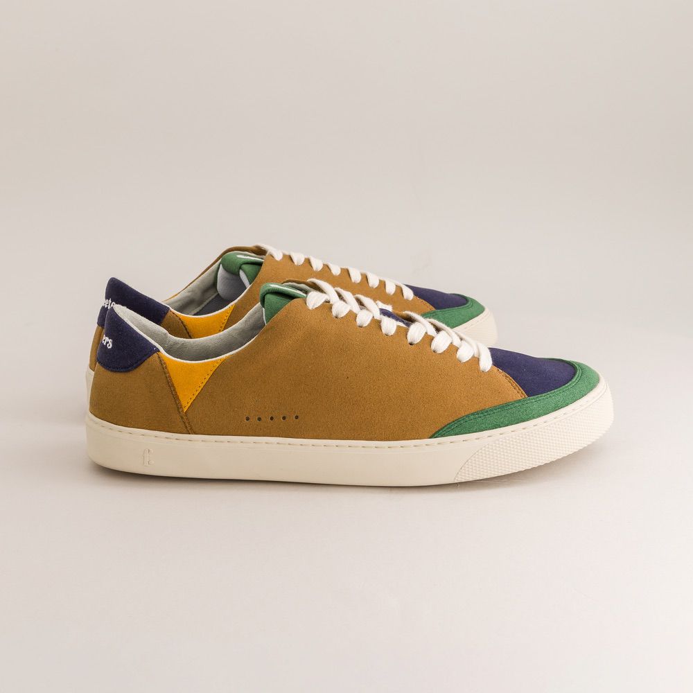 Multicolored barefoot sneakers on a light gray background