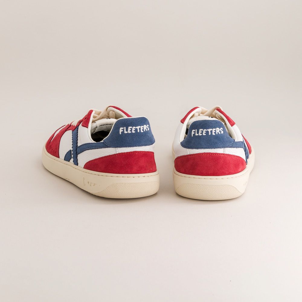 Red, white, and blue sneakers with 'Fleeters' branding on a light gray background