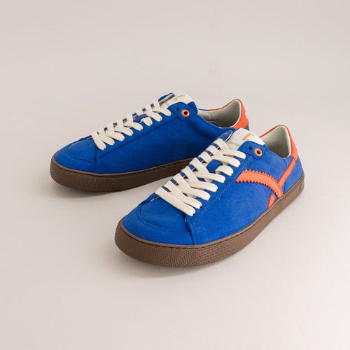 Blue barefoot sneakers with white laces and orange accents on a light gray background