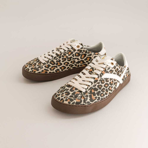 Leopard print barefoot sneakers with brown soles on a light gray background